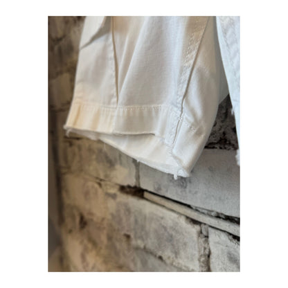 Women’s white surplus cargo shorts by G1 Women’s, featuring multiple pockets and a relaxed fit, shown on model.