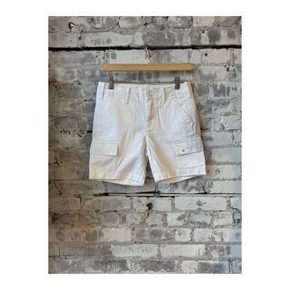 Women's white G1 Surplus Cargo Shorts showing front view with multiple pockets and relaxed fit.