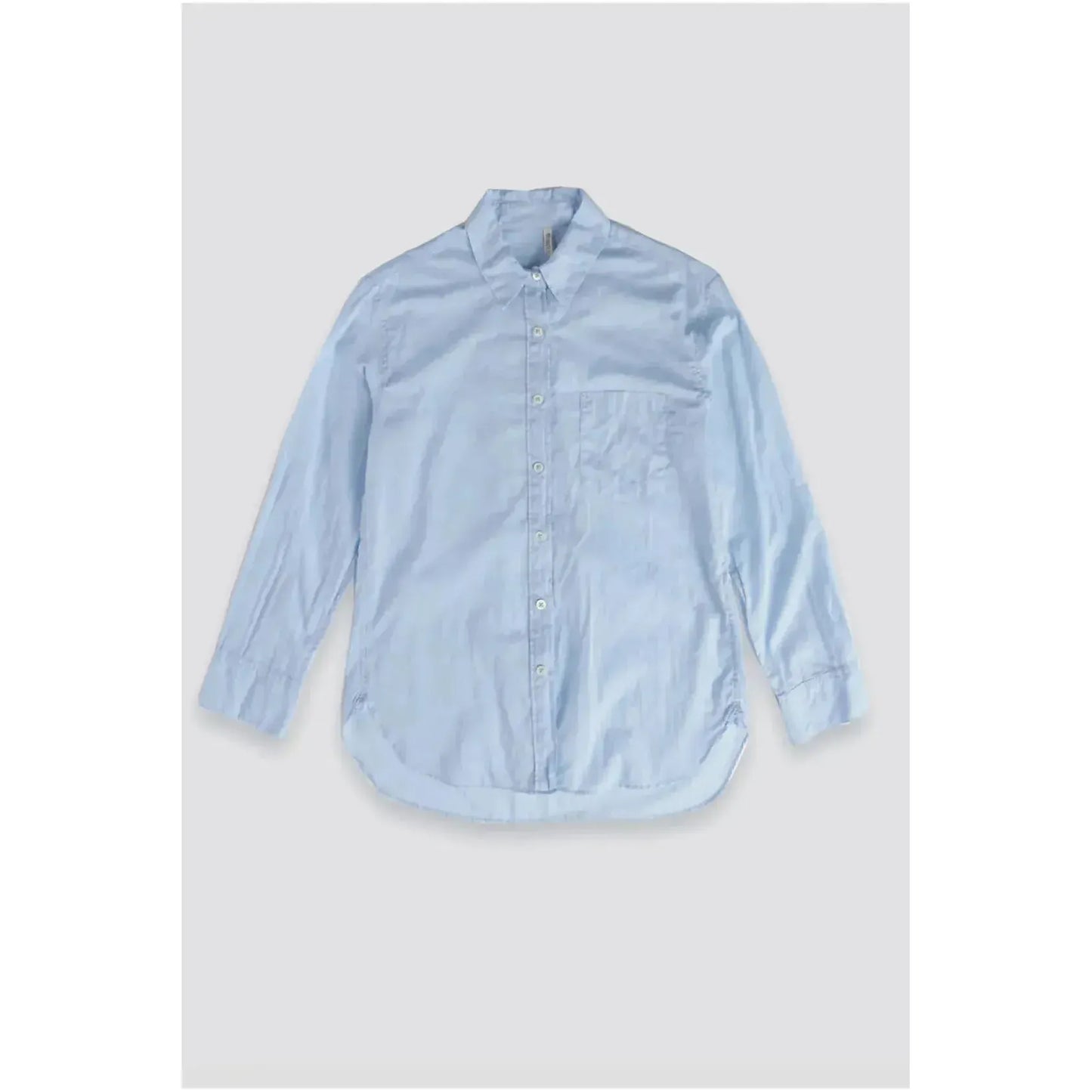 Women's airy periwinkle shirt by G1 Women's, lightweight blouse with a relaxed fit and soft fabric, displayed on a hanger.