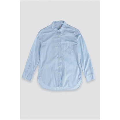Women's airy periwinkle shirt by G1 Women's, lightweight blouse with a relaxed fit and soft fabric, displayed on a hanger.