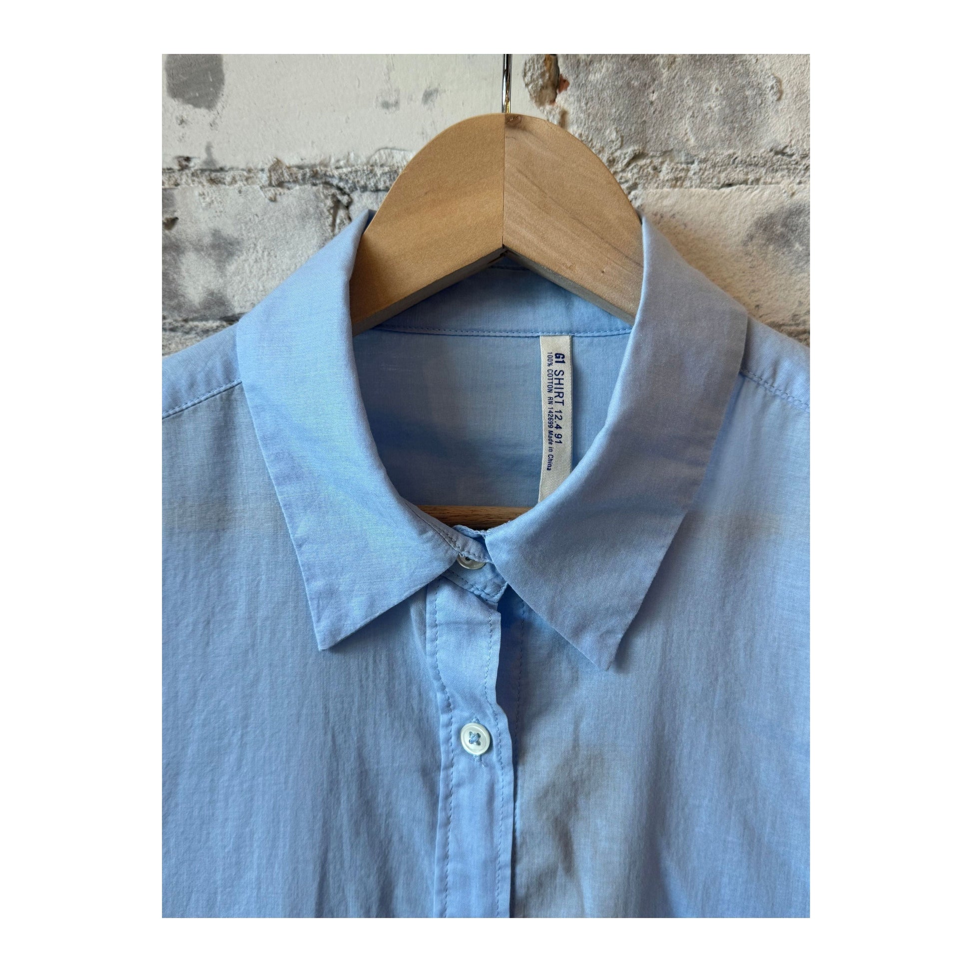 Light periwinkle women's airy shirt by G1 Women's, featuring a relaxed fit and soft fabric for comfortable wear.