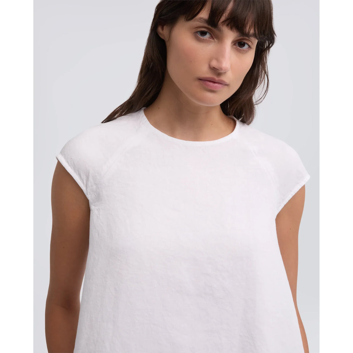 Women's white garment-dyed compact slub linen dress by Aspesi, showcasing a relaxed fit and casual summer style.