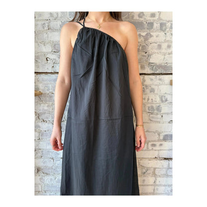 Black women's gathered asymmetrical dress by Closed Women's, featuring a stylish draped design and unique asymmetric hem.