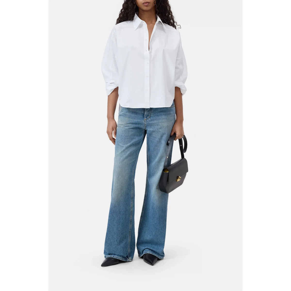 White gathered cotton shirt for women by Closed Women's, featuring a relaxed fit and soft fabric, displayed on a hanger.