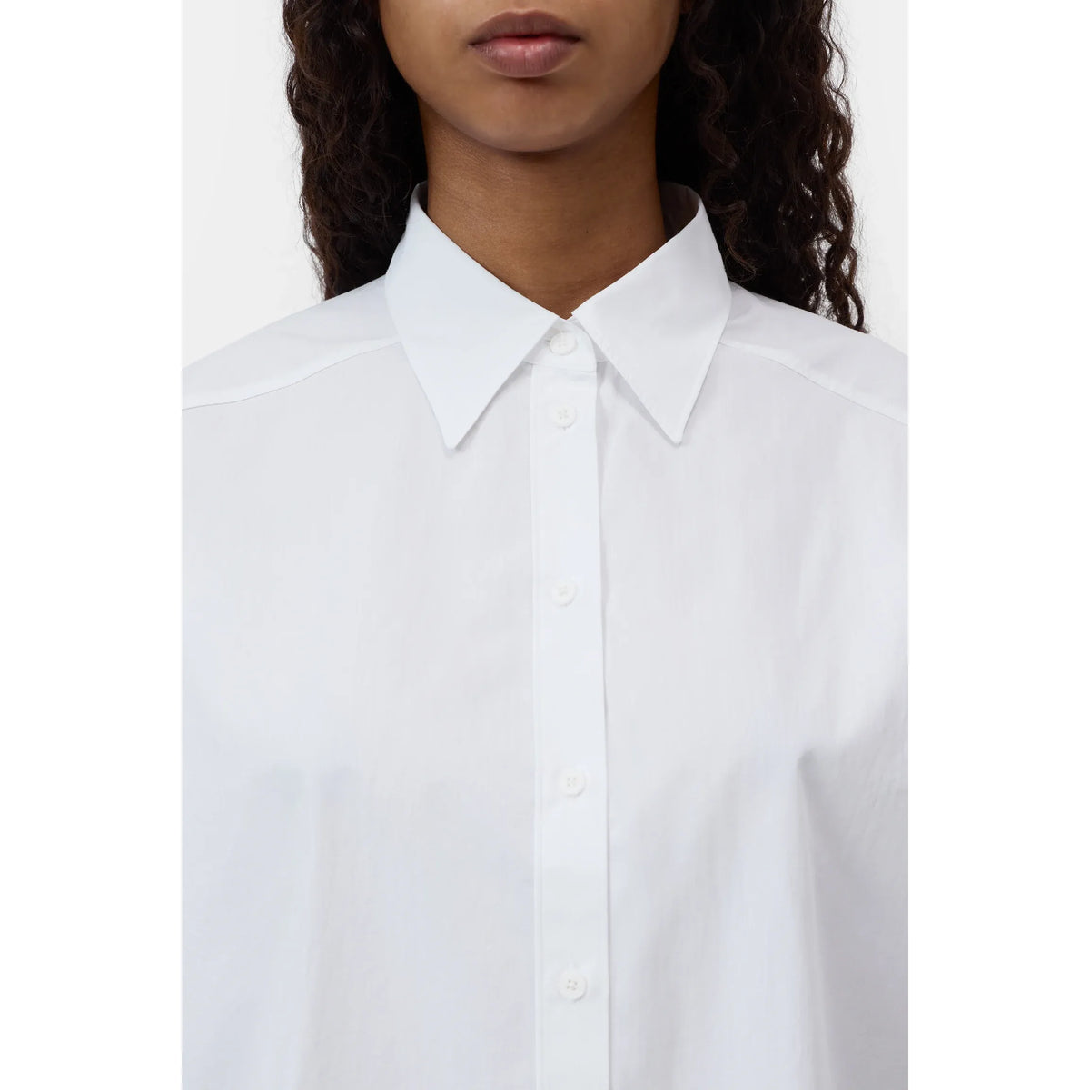 White women's Gathered Cotton Shirt by Closed Women's, featuring a relaxed fit and gathered details, displayed on a hanger.