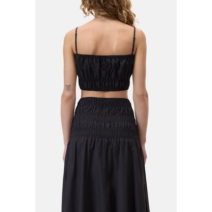 Black women's gathered top by Closed, featuring a relaxed fit with ruched detailing and long sleeves, perfect for casual wear.