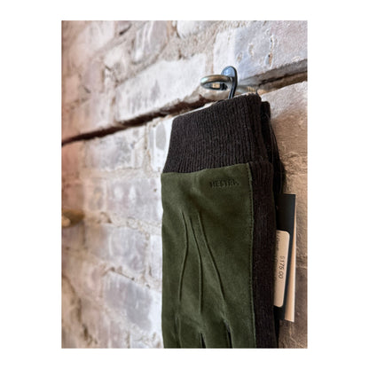 Men's Hestra Geoffrey Glove in dark olive leather with soft lining, showcasing the stylish and functional outdoor glove design.
