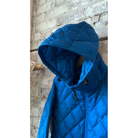 Women's Ginger Nylon Ripstop Jacket by Aspesi in Azzurro, shown in a close-up image highlighting the lightweight, durable fabric.