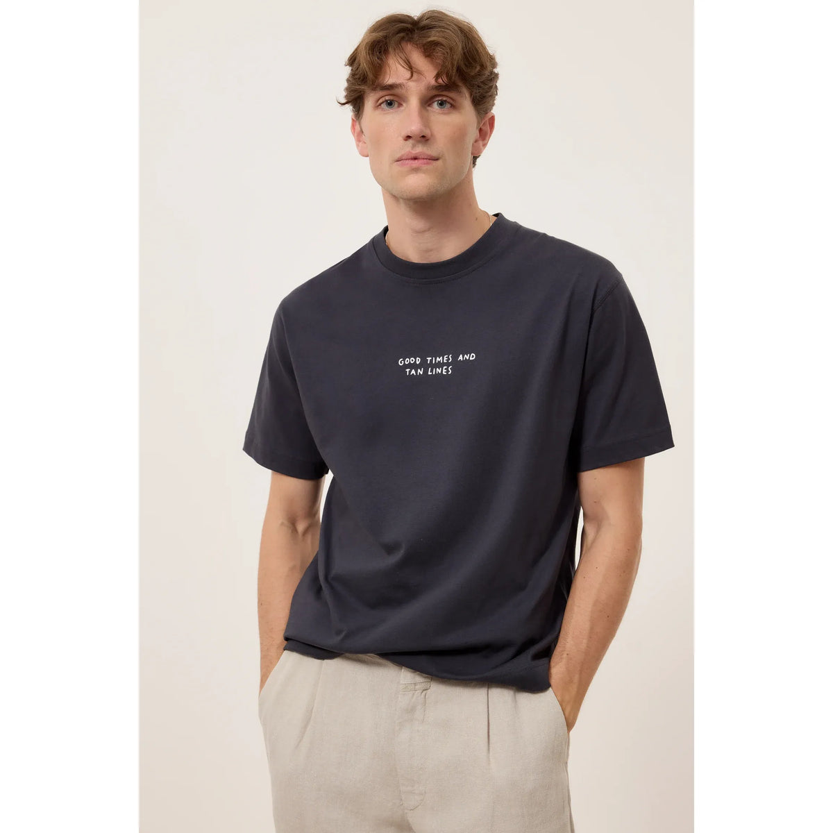 Closed Men's "Good Times and Tan Lines" organic cotton T-shirt in magma black, shown flat with front view.