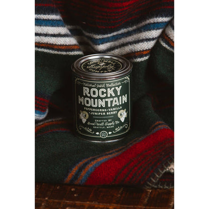 Half-pint Rocky Mountain National Park candle by Good & Well Supply Co., featuring a scenic mountain landscape on the label.