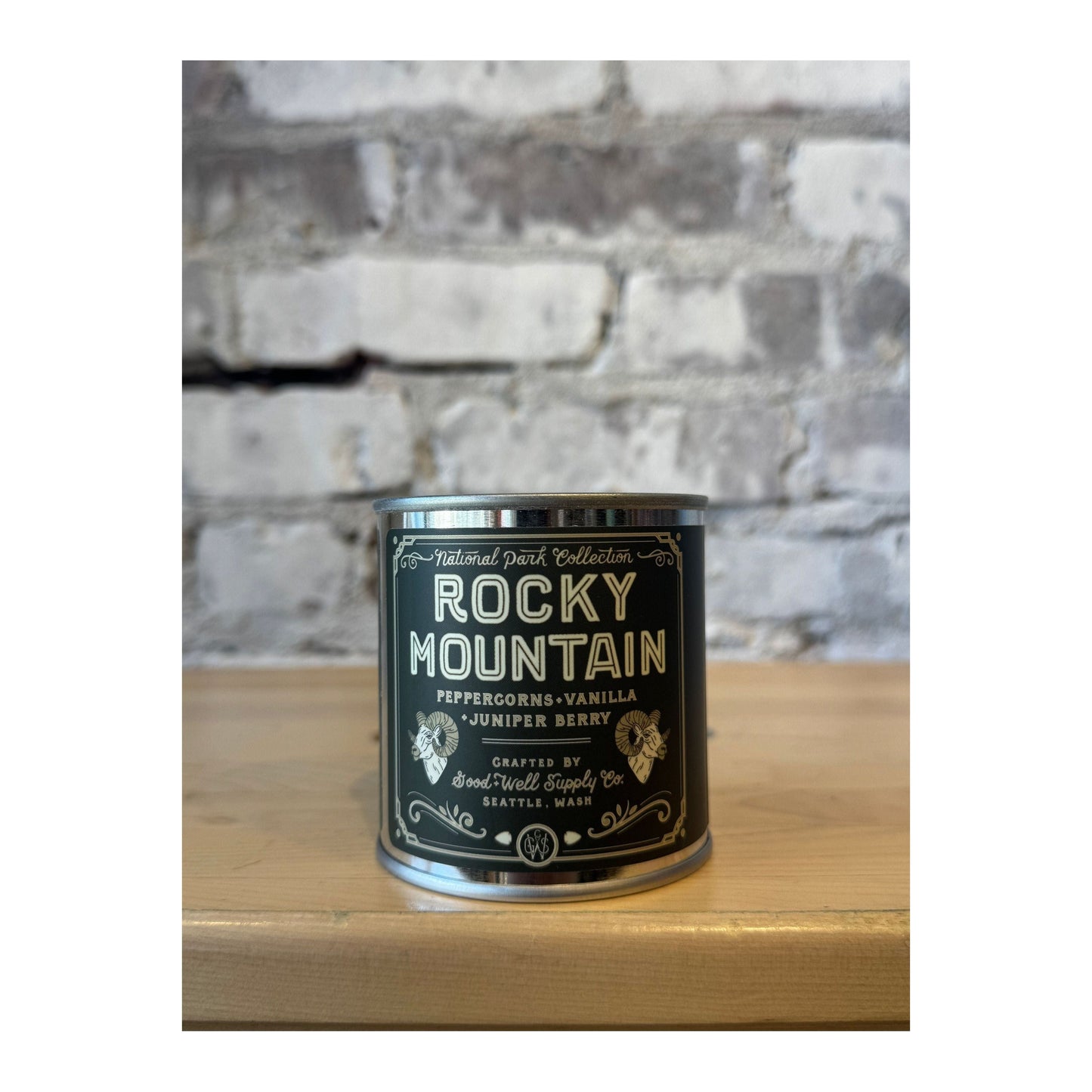 Half-pint candle featuring Rocky Mountain National Park design by Good & Well Supply Co. for home decor and ambiance.