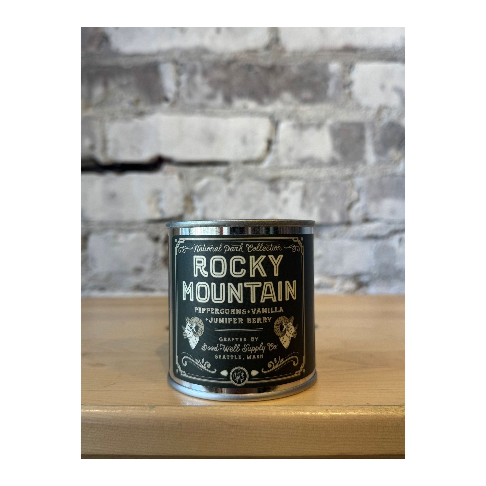 Half-pint candle featuring Rocky Mountain National Park design by Good & Well Supply Co. for home decor and ambiance.