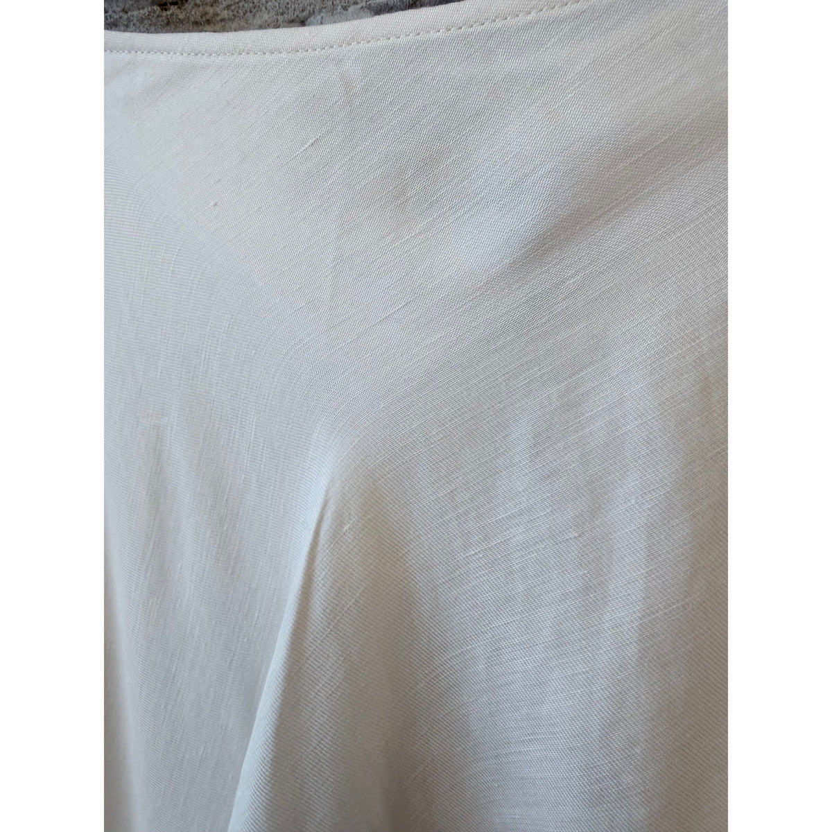 White Greek linen skirt for women by ACARIA STUDIO, featuring lightweight fabric and a flowing, stylish design.