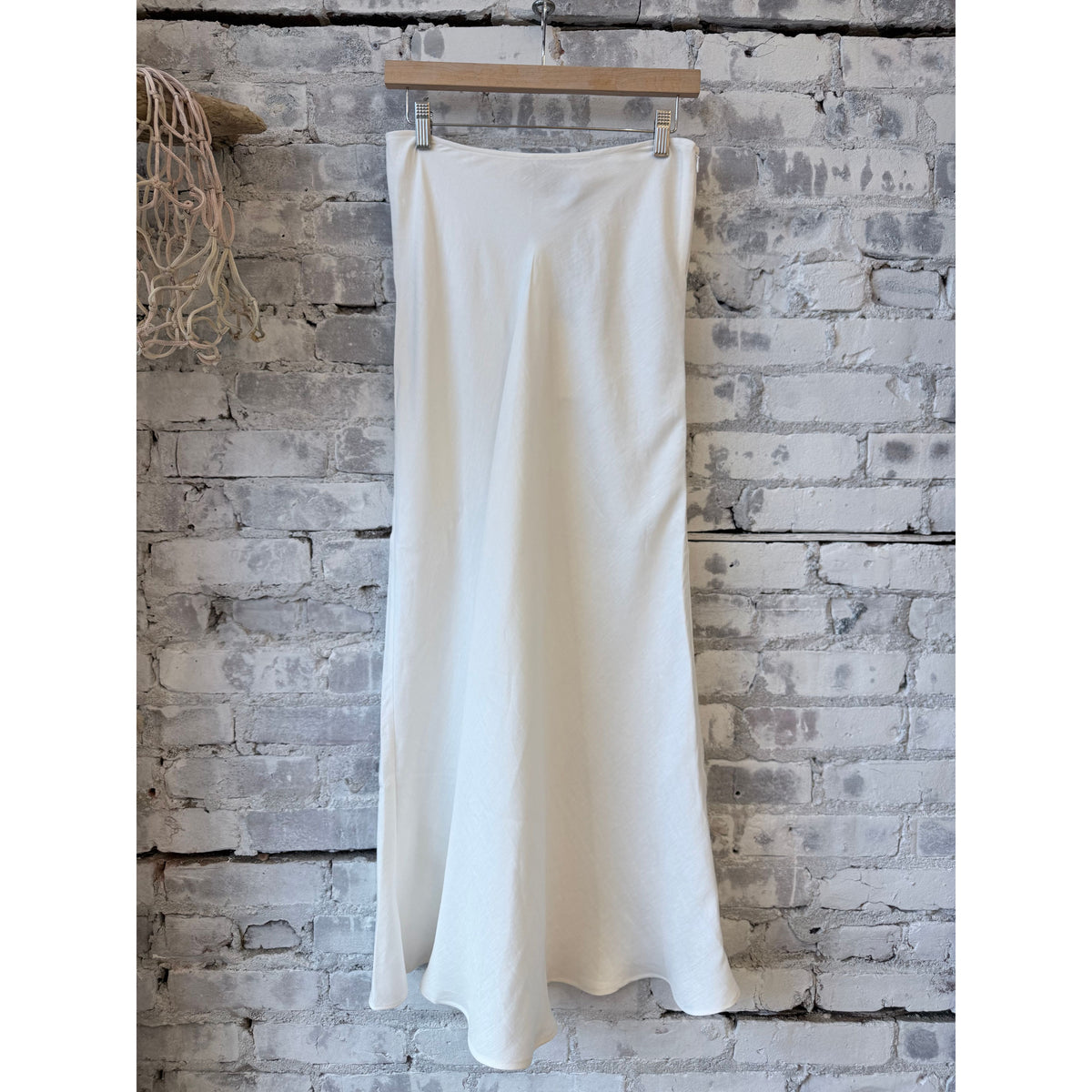 Women's Greek linen skirt in white by ACARIA STUDIO, featuring a lightweight, flowy design perfect for casual and summer wear.
