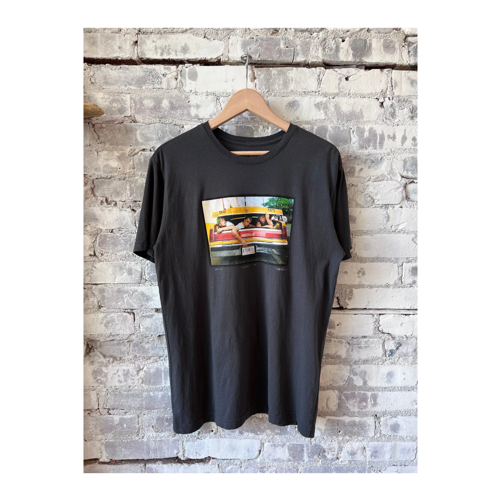 Men's Green Day Car SS Tee by Danny Clinch in faded black, featuring a classic band graphic on the front.