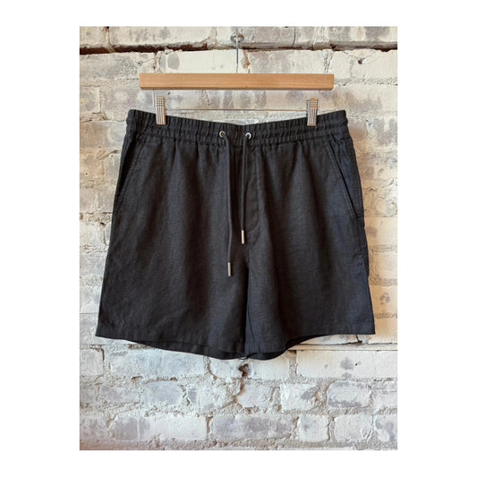 Men's black linen shorts with drawstring waist by NN07, casual style, shown on a model.