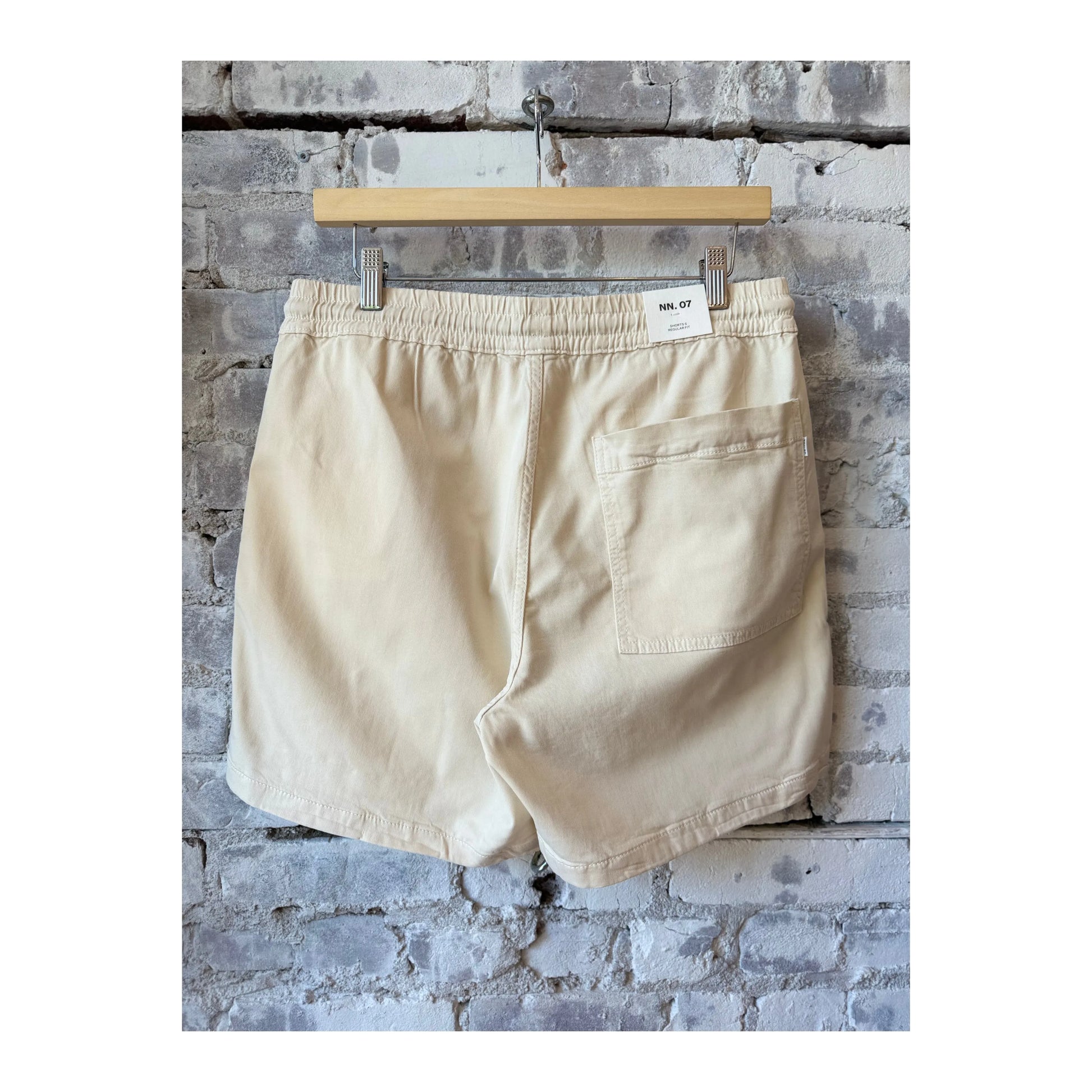 Men's NN07 Gregor Lyocell Blend Shorts in vanilla color, featuring a relaxed fit and casual style, perfect for summer wear.
