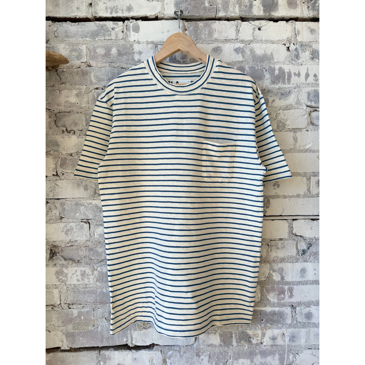Men's La Paz Guerreiro T-Shirt with indigo stripe pattern, soft fabric, and comfortable fit.