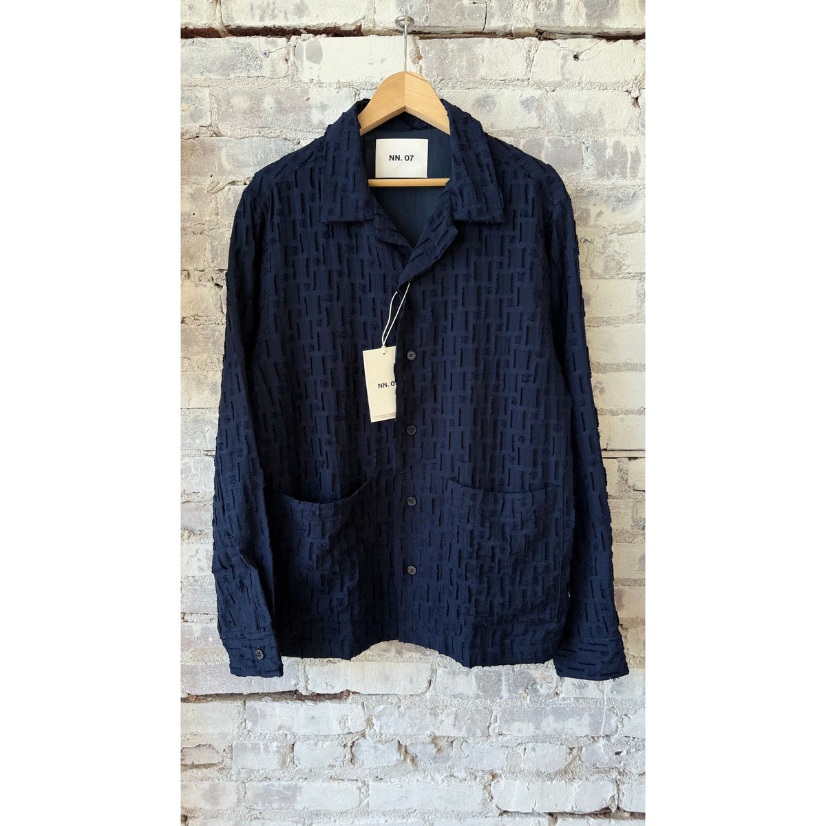 Men's navy blue Hank Fil-Coupé Jacquard over shirt by NN07, featuring detailed woven fabric and classic collar design.