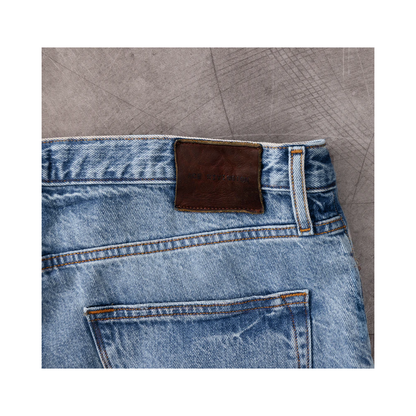 Men's Ace Rivington Harlan Straight Archive Selvedge 12oz jeans in Decade Wash, showcasing the fit and textured denim fabric.