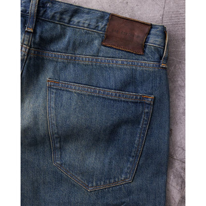 Men's Harlan Straight Archive Selvedge 12oz jeans by Ace Rivington in mechanic wash, showing the denim's texture and fit.