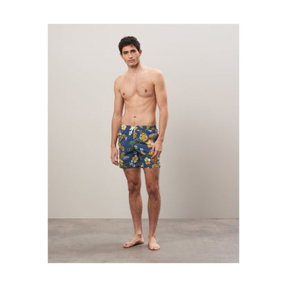 Men's navy swim trunks with hibiscus print made from recycled nylon by Hartford Men's, featuring a comfortable fit and vibrant design.