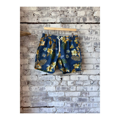 Men's navy swim trunks with hibiscus print made from recycled nylon by Hartford Men's, featuring a stylish tropical design.