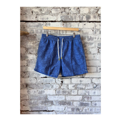 Men's Hartford blue nylon swim trunks with palms print, featuring a relaxed fit and adjustable waistband for beach or poolside wear.