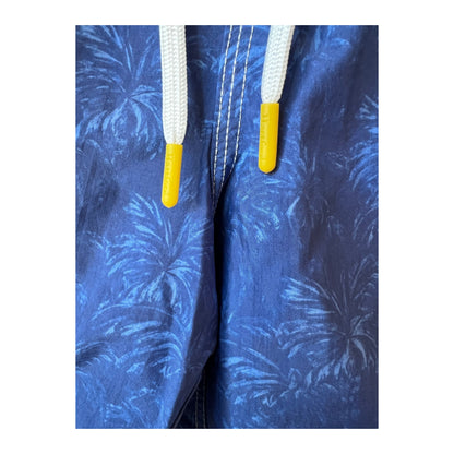 Men's Hartford nylon swim trunks with blue palms print, featuring a relaxed fit and quick-drying fabric.
