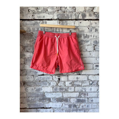 Men's Hartford faded coral swim trunks with matching pochette, featuring a relaxed fit and vibrant color.