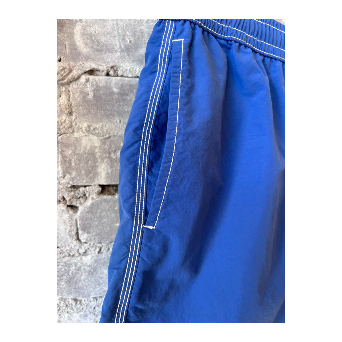 Men's Hartford Classic Swim Trunks and Pochette in ocean blue, featuring a stylish design and comfortable fit.