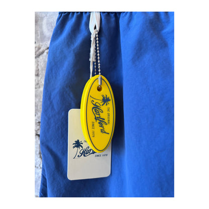 Men's Hartford Classic Swim Trunks with Ocean-themed design and matching pochette, perfect for summer beach days.