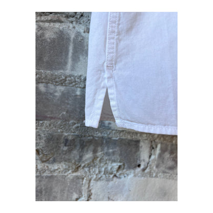 Men's white Palm Mc Pat shirt by Hartford Men's, displayed on a hanger with a casual, clean look.