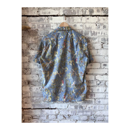 Men's Hartford "Parrot" Palm Mc Shirt in blue, featuring a tropical palm print, long sleeves, and a casual fit.