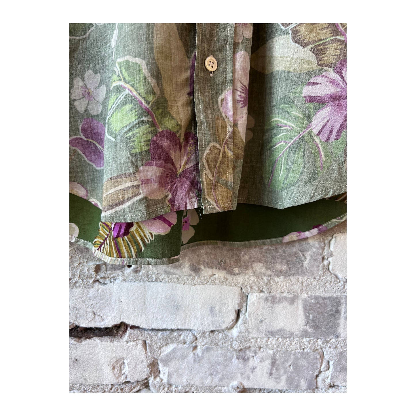 Men's Hartford Hawaiian print cotton shirt in army green, featuring a vibrant tropical floral pattern.