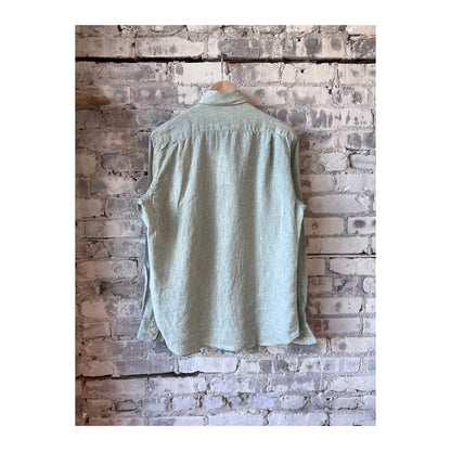 Men's Hartford Paul Linen Chambray Shirt in green, shown laid flat with collar and button details.