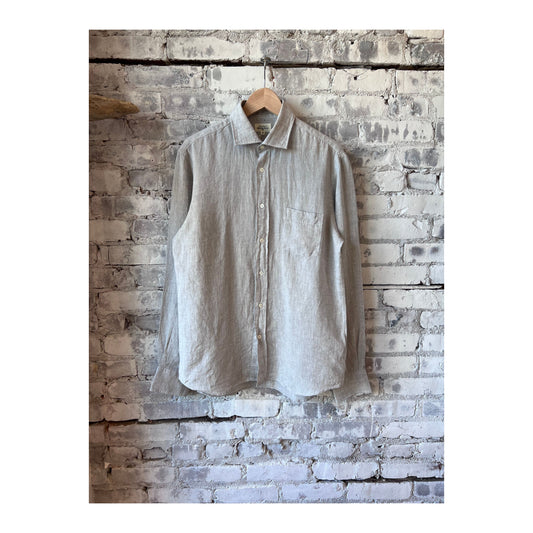 Men's Hartford Paul Linen Chambray Shirt in grey, lightweight and casual with a button-down collar, displayed on a hanger.