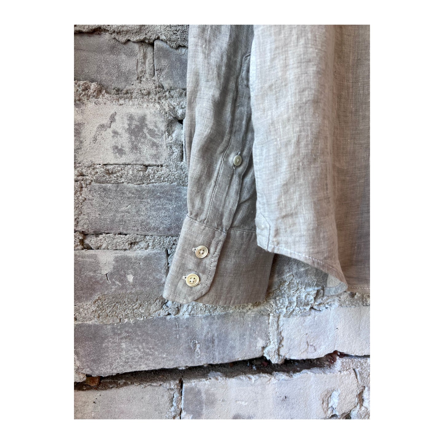 Men's Paul Linen Chambray Shirt in grey by Hartford Men's, shown on a hanger with a casual fit and soft fabric texture.