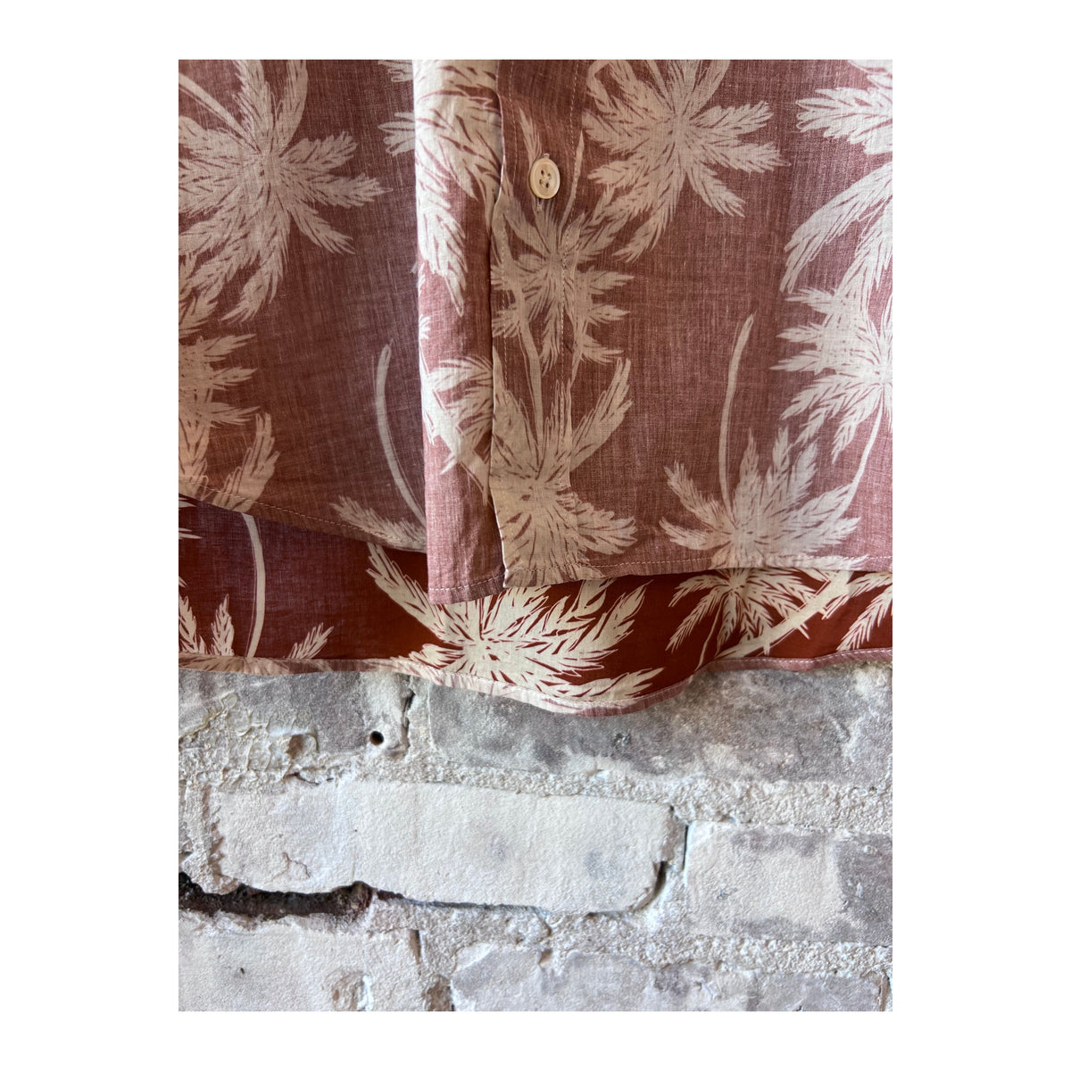 Men's Hartford cotton shirt with rust palm tree print, casual short-sleeve design, lightweight and comfortable for warm weather.