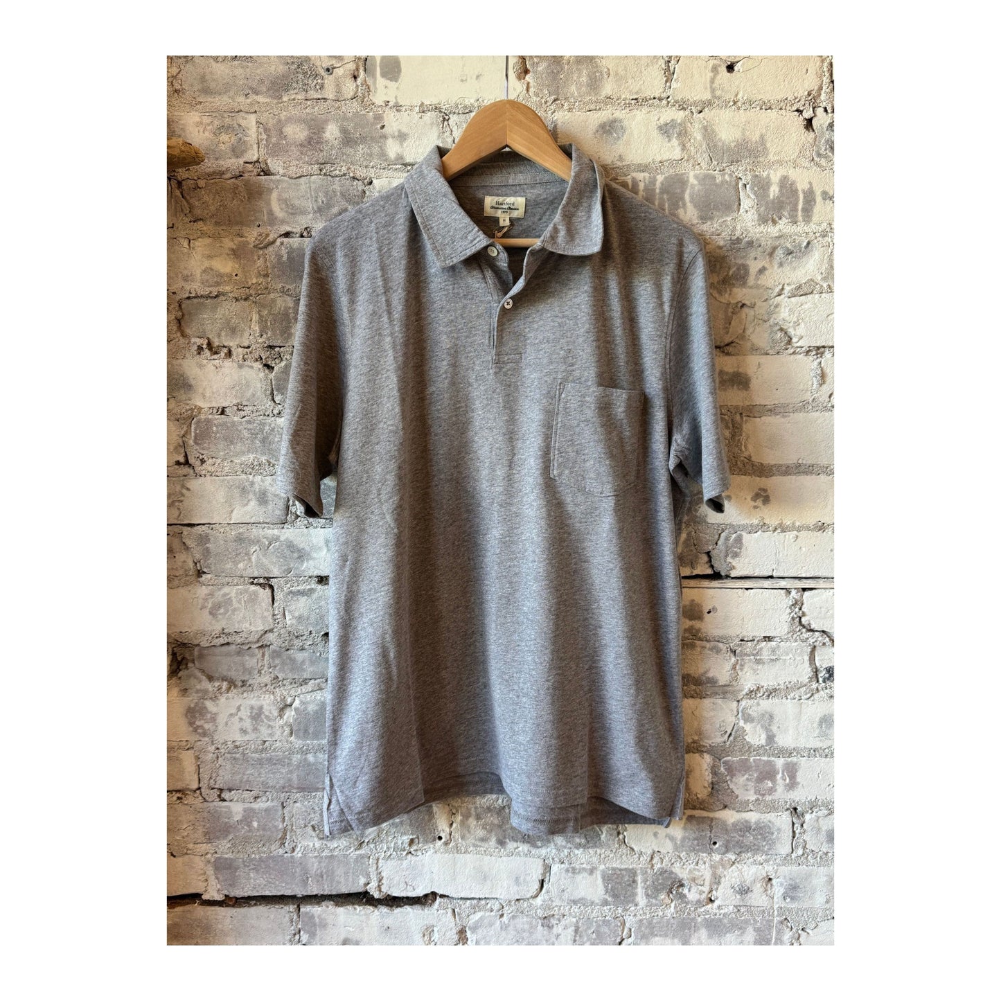 Men's Hartford Cotton Jersey Polo in Heather Grey, showcasing a classic fit with a collar, short sleeves, and subtle stitching details.
