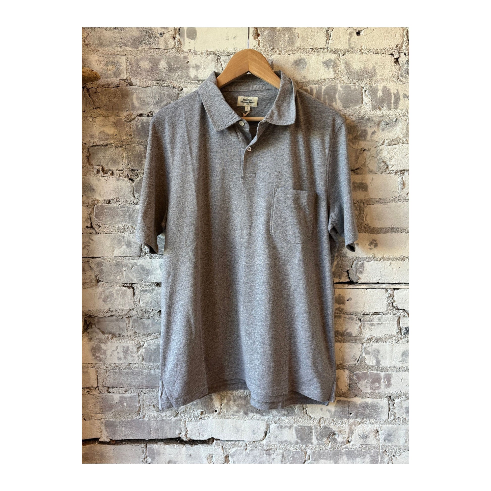 Men's Hartford Cotton Jersey Polo in Heather Grey, showcasing a classic fit with a collar, short sleeves, and subtle stitching details.