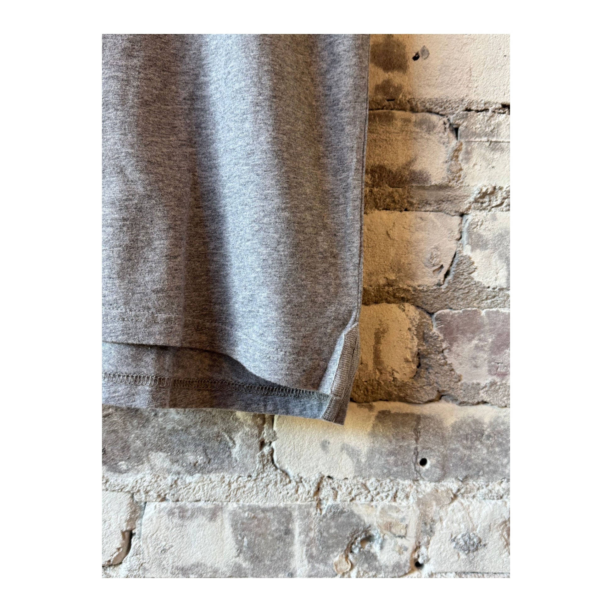 Men's Hartford Heather Grey Cotton Jersey Polo shirt, casual style with a classic collar and short sleeves.