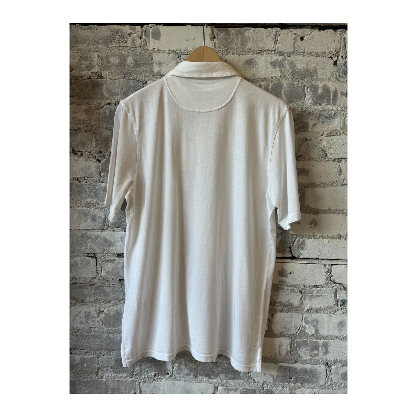Men's white cotton jersey polo shirt by Hartford Men's, featuring a classic collar and short sleeves.