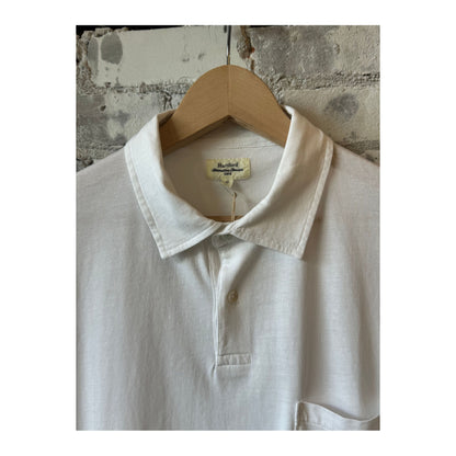 Men's white SS Cotton Jersey Polo shirt by Hartford Men's, shown flat with collar and short sleeves.