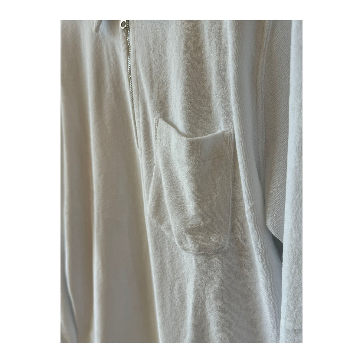 Men's white Terry Zip Sweatshirt by Hartford Men's, featuring a front zipper and casual fit, shown on a model.