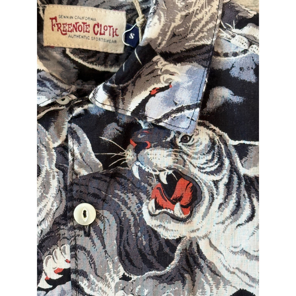 Black Hawaiian Tiger shirt for men by Freenote Cloth, featuring a bold tropical tiger print on lightweight fabric.