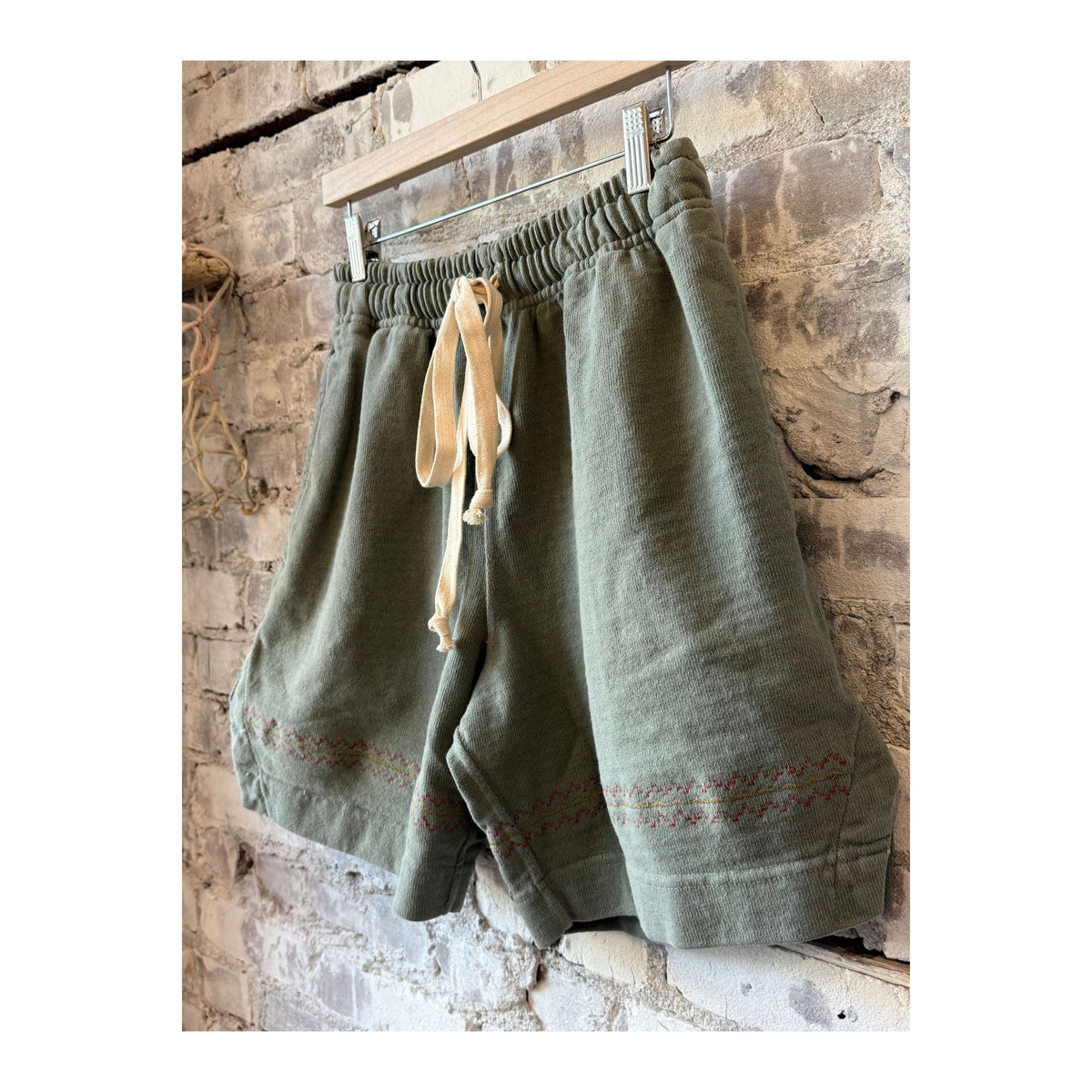 Men's heavyweight gym class shorts in pond green by MONOSTERO, featuring a comfortable fit and durable fabric for active wear.