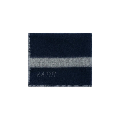 Amundsen Herdsman Blanket in faded navy, soft cozy accessories with fringed edges, perfect for warmth and style.
