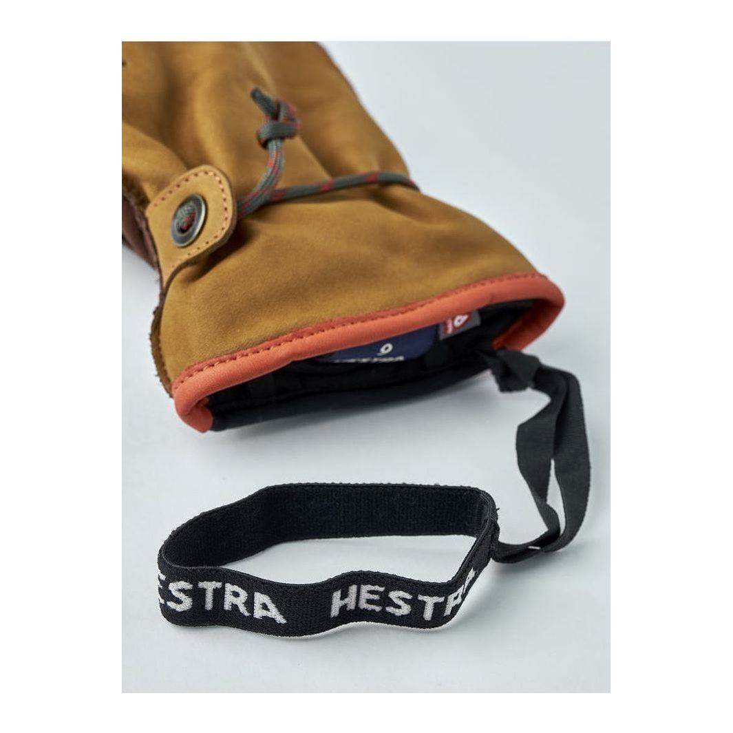 Men's Hestra Wakayama Mitt in cork and brown leather, showing the textured cork and smooth brown leather exterior.