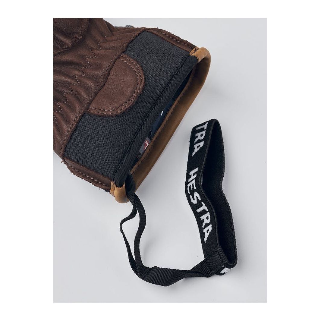 Men's Hestra Wakayama Mitt in navy and brown, made of durable leather with detailed stitching and warm lining.